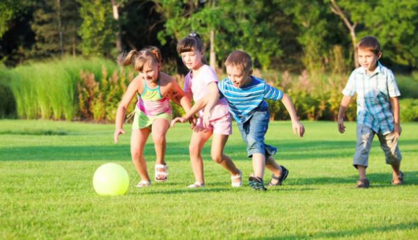 Kids-playing-in-a-garden